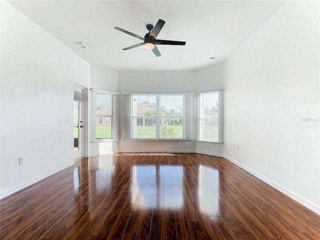 unfurnished room with wood-type flooring and ceiling fan