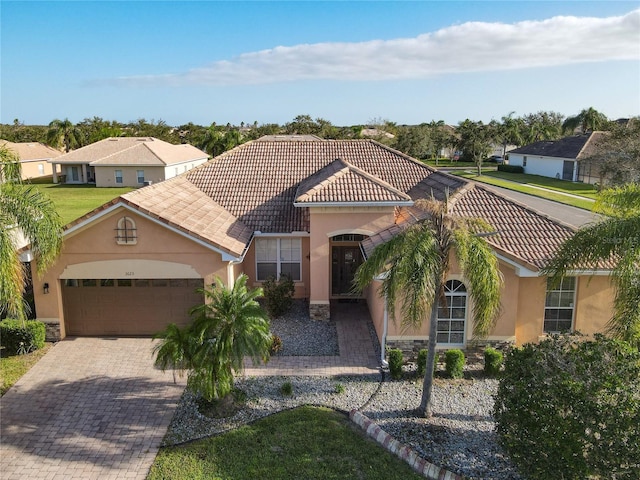 3623 Weatherfield Dr, Kissimmee, FL 34746 - mediterranean / spanish-style home featuring stucco siding and a tile roof