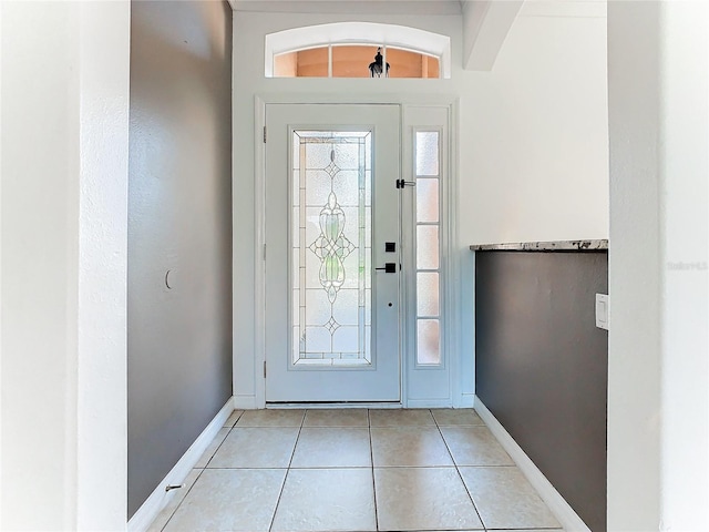 foyer featuring light tile patterned floors