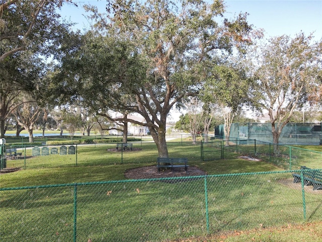 3623 Weatherfield Dr, Kissimmee, FL 34746 - view of property's community featuring a lawn and fence