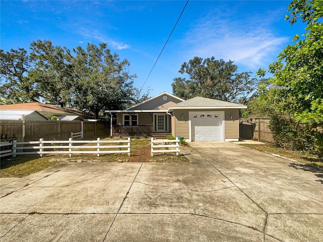 ranch-style home featuring a porch and a garage