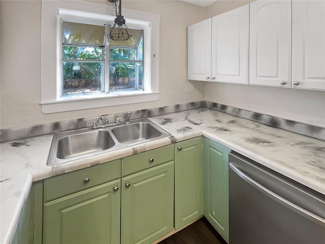 kitchen with sink, dishwasher, decorative light fixtures, and white cabinets