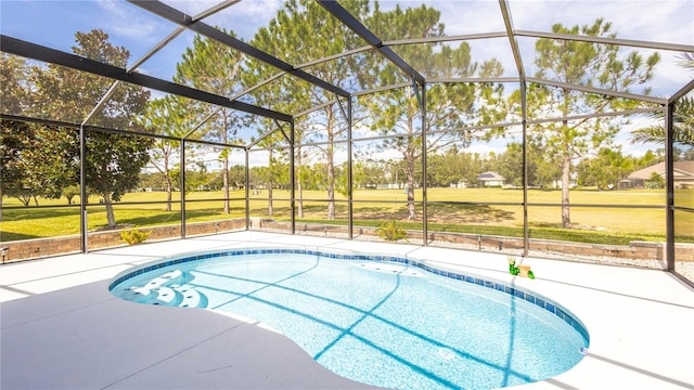 view of pool featuring a patio area and a lanai