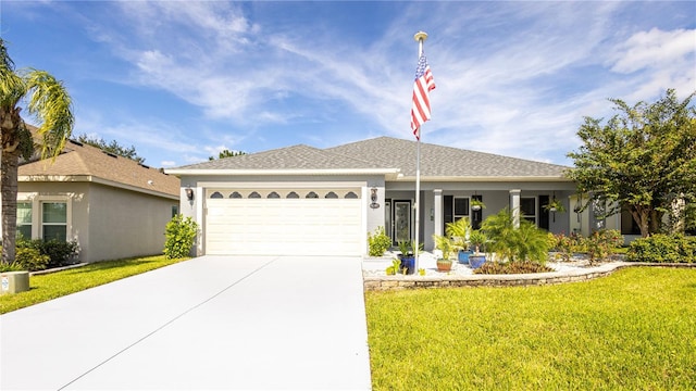 ranch-style house with a garage and a front lawn