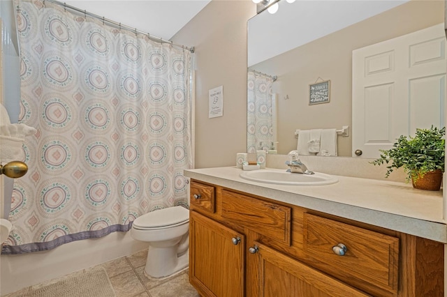 full bathroom featuring vanity, toilet, shower / bath combo with shower curtain, and tile patterned flooring