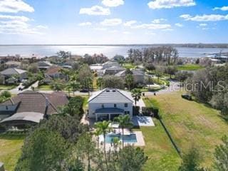 drone / aerial view with a water view