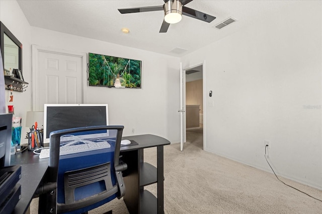 office area featuring ceiling fan and carpet floors