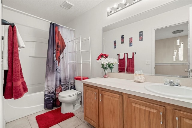 full bathroom featuring tile patterned flooring, a textured ceiling, shower / bathtub combination with curtain, vanity, and toilet