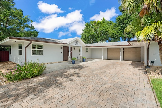 ranch-style home with a garage