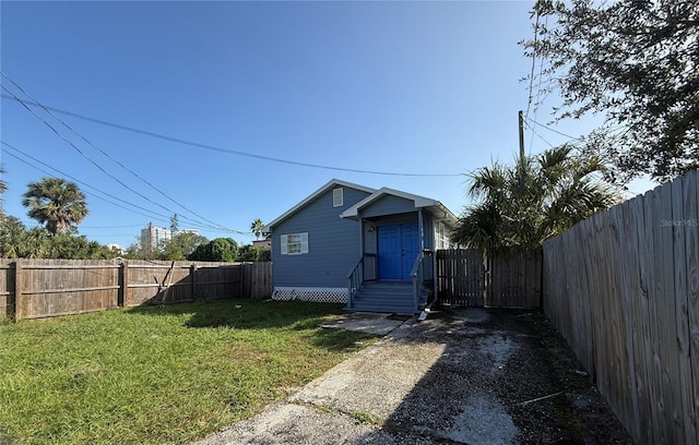 exterior space featuring a lawn