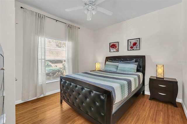 bedroom featuring ceiling fan and wood-type flooring