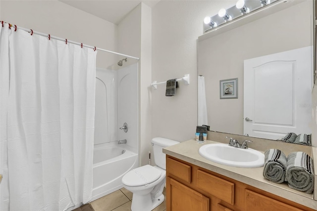 full bathroom with vanity, shower / bath combo with shower curtain, toilet, and tile patterned flooring