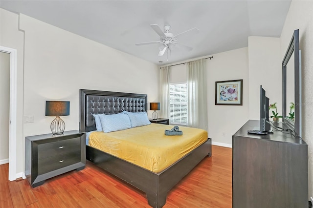 bedroom featuring ceiling fan and hardwood / wood-style flooring