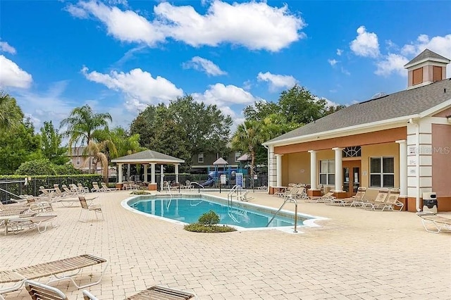 view of swimming pool featuring a gazebo and a patio