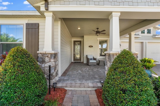 property entrance with ceiling fan