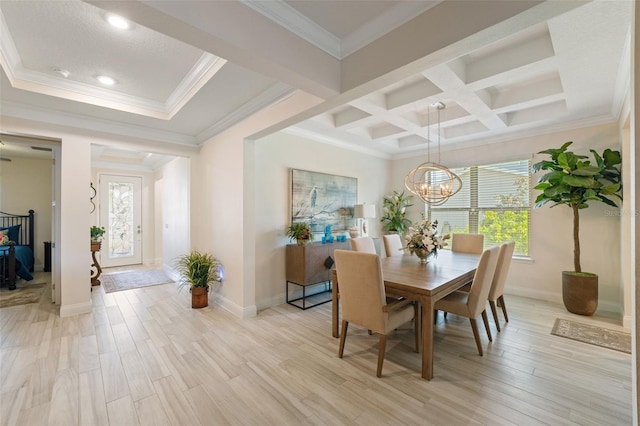 dining room featuring crown molding, light hardwood / wood-style floors, and coffered ceiling