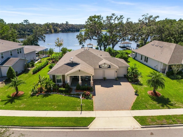 birds eye view of property featuring a water view