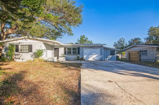 single story home featuring a garage