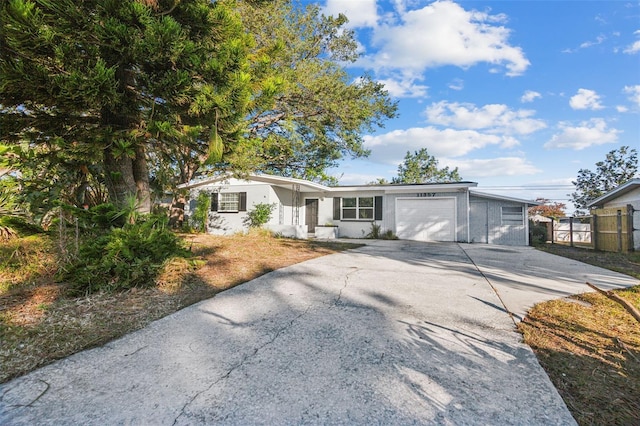 single story home featuring a garage