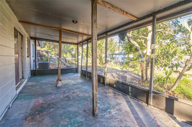 unfurnished sunroom featuring plenty of natural light