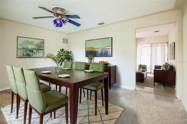 dining area with ceiling fan