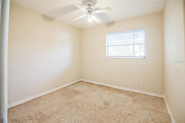 empty room featuring ceiling fan