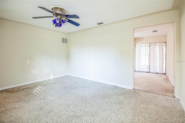 spare room with ceiling fan