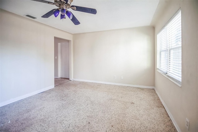 empty room featuring ceiling fan