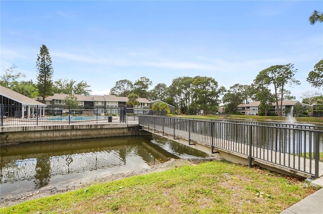 dock area with a water view