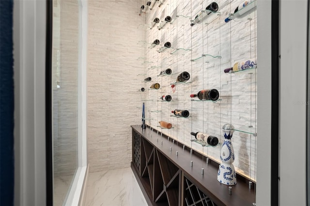 wine room featuring tile walls