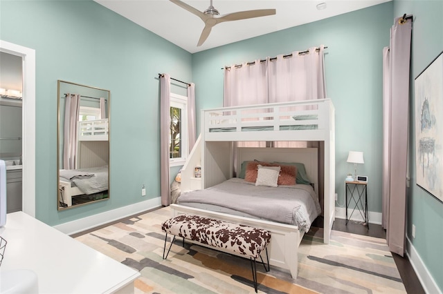 bedroom with ceiling fan and light hardwood / wood-style flooring