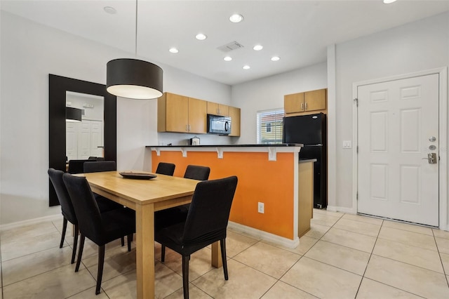 view of tiled dining space