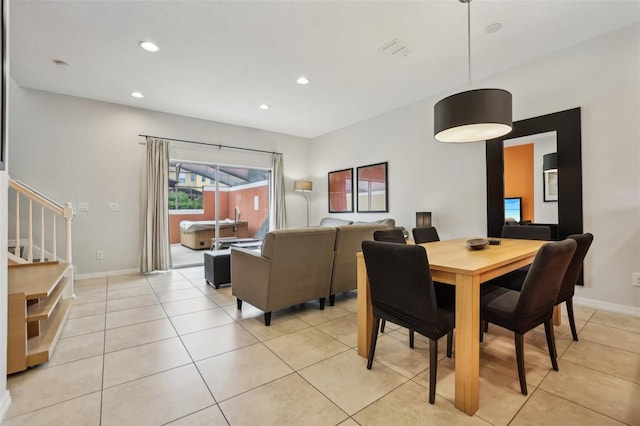 dining room featuring light tile patterned flooring