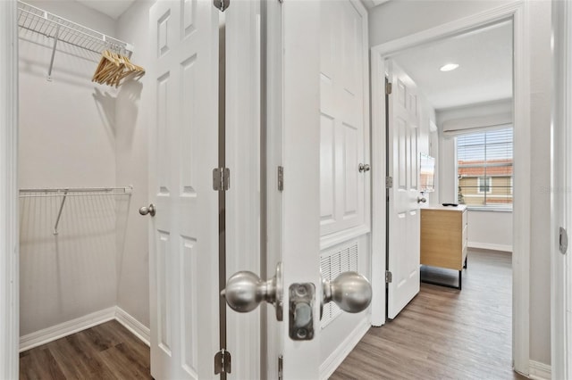 hallway featuring hardwood / wood-style floors