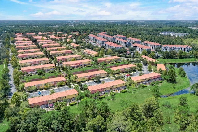 drone / aerial view with a water view