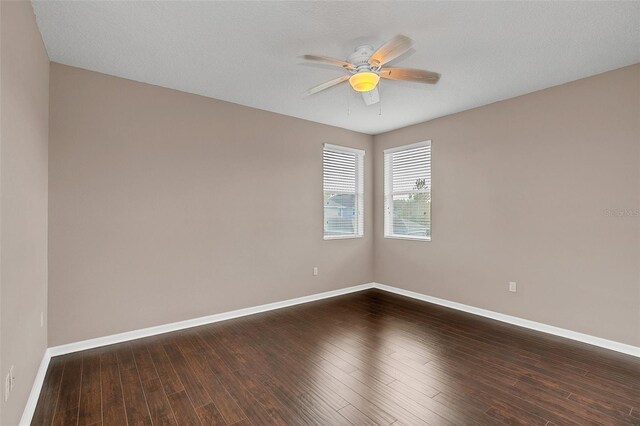 spare room featuring hardwood / wood-style floors, a textured ceiling, and ceiling fan