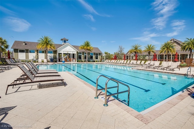 view of swimming pool featuring a patio area