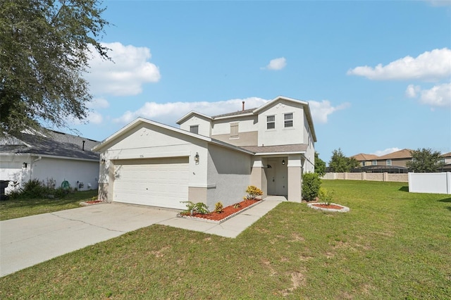 view of front of house with a front yard and a garage