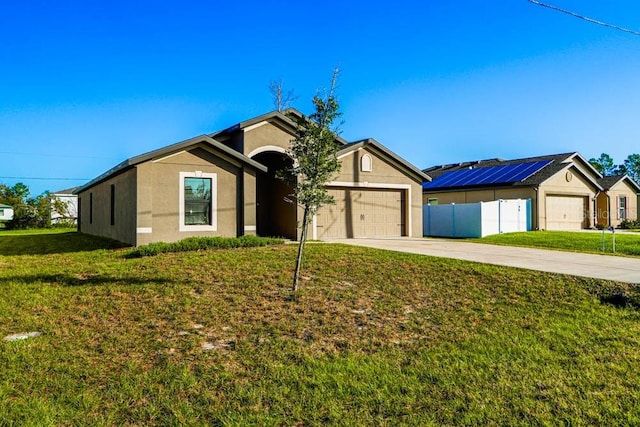 single story home with a front lawn and a garage