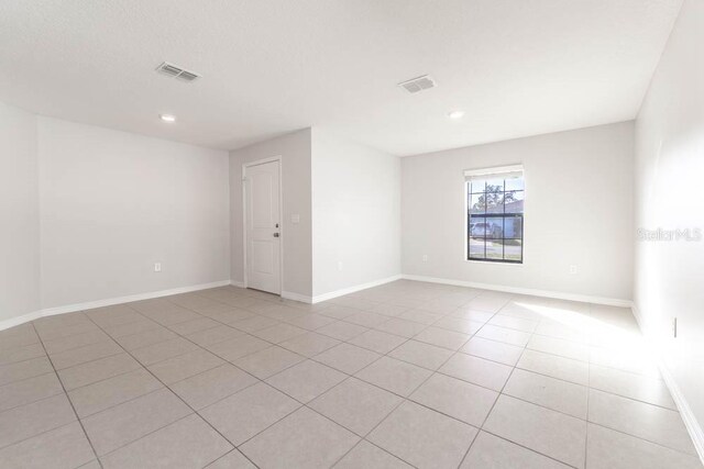 view of tiled empty room