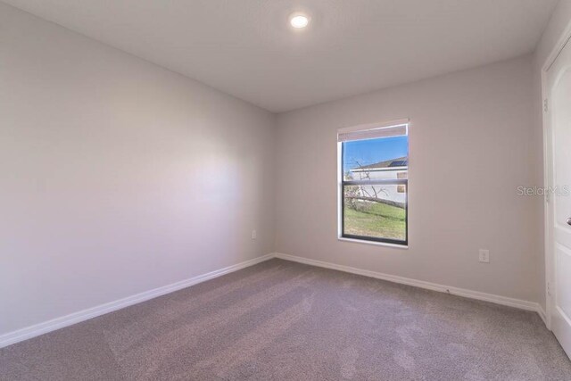 view of carpeted spare room