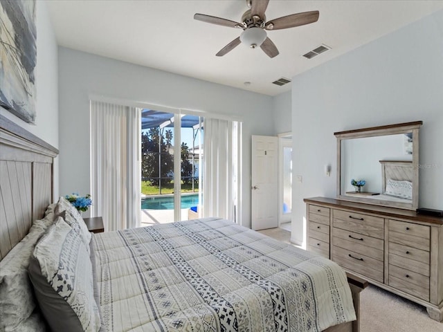 bedroom featuring access to exterior, light colored carpet, and ceiling fan