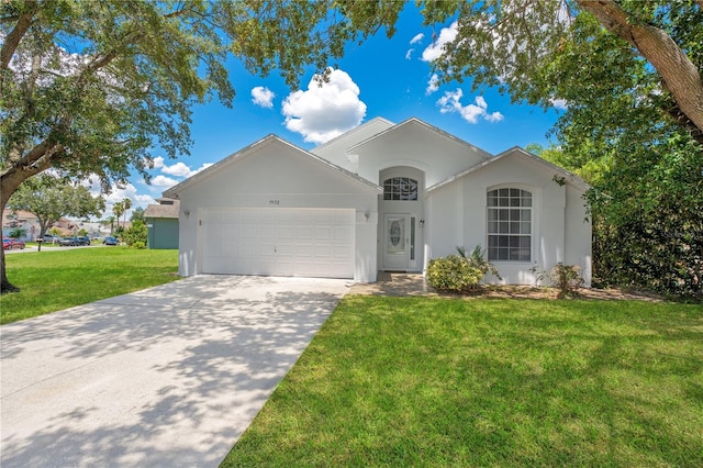 ranch-style house with a front lawn and a garage