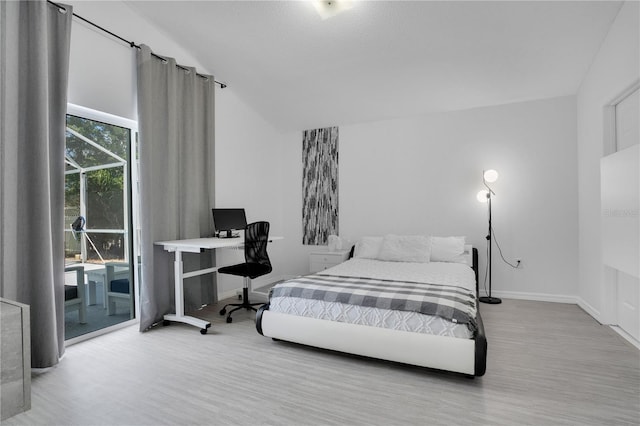 bedroom with vaulted ceiling