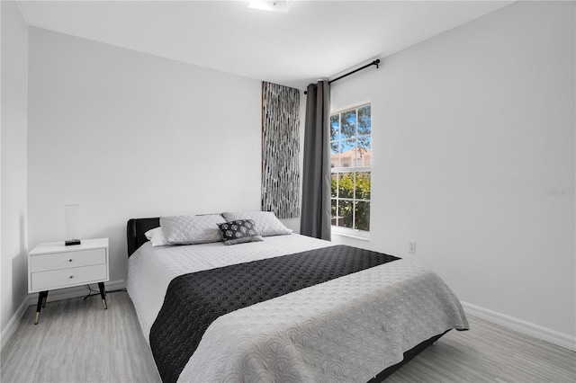 bedroom featuring light hardwood / wood-style flooring