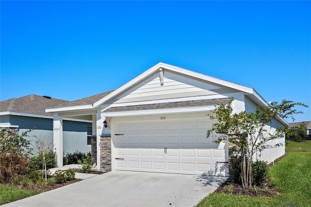 single story home with a garage