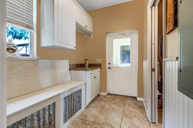 interior space featuring light tile patterned floors