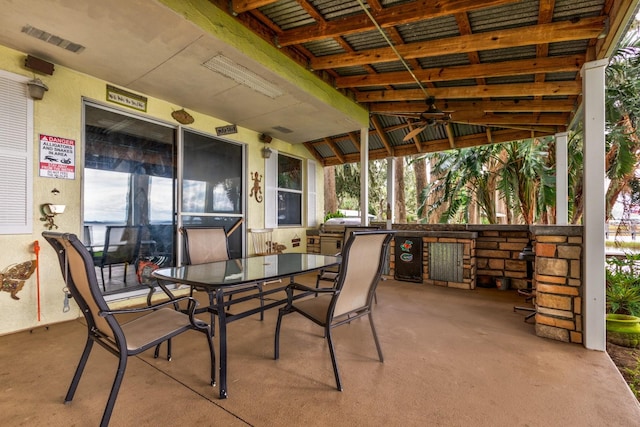 view of patio with ceiling fan