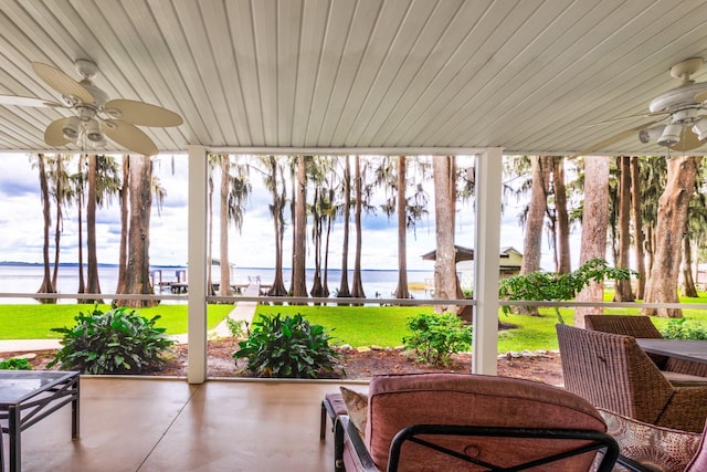 sunroom with a water view