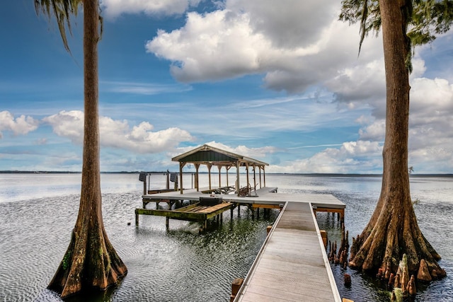 view of dock with a water view